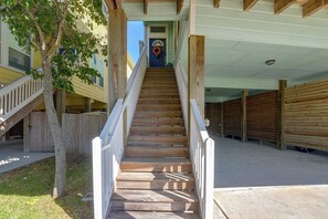 A wooden staircase leading to a door with a wreath, flanked by wooden railings and a tree. - Steps to Sylvan Beach Park! Family Getaway (La Porte)