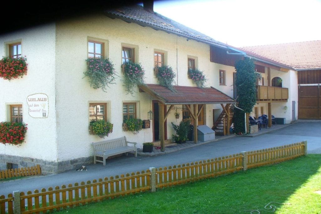 A building with a sign indicating it is a guesthouse.