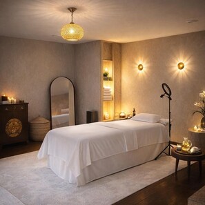 A modern bedroom with a bed, bedside lamps, a mirror, and a vanity with a lamp. - A 150-square-meter home with a private spa and a view of the Lot—just for the two of you! (bellefont laroque)