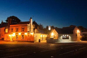 A building with a sign that reads 'The Five Bells' and a sign indicating 'OPEN' above the entrance. - The Five Bells (Ringwould)