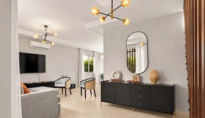 A modern living room with a flat-screen TV, two armchairs, a dining area with a table and chairs, a black console with decorative items, and a large mirror on the wall. - NOK Tropical 3BR Villa  Private Pool & BBQ (Punta Cana)