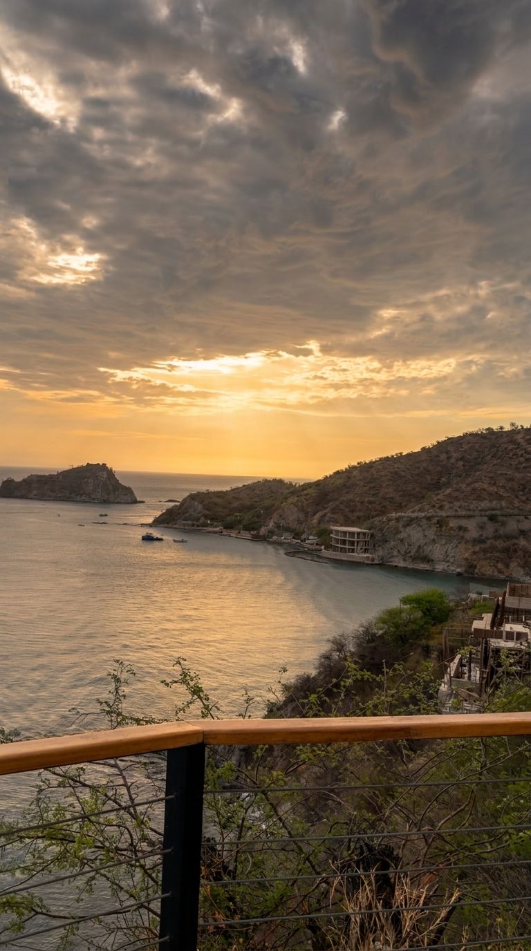 A coastal landscape with a view of the sea, a rocky hill, and a building with a balcony.