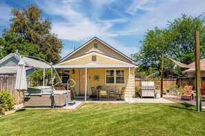 A single-story house with a covered porch, a grill, and a small table and chairs. - #StayInMyDistrict 2Bed DogsOk Spa Monthly Rental (Boise)