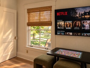 A fun space just for the kids, complete with bunks, twin trundle, Smart TV and interactive electronic game table. - Carriage House on 32nd (Billings)