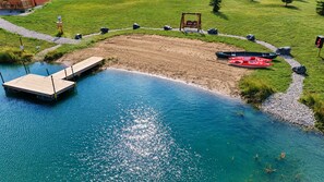 A clear blue swimming pool with a wooden deck and a dock. - 2BR Retreat on Trout Pond / Full Kitchen & Laundry (Bearberry)