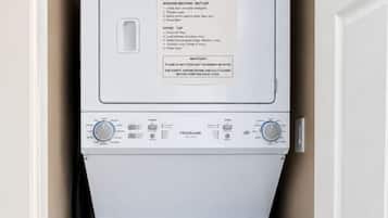 Laundry & Essentials: Enjoy the convenience of a modern full-size washer and dryer with whole utensil in sink drawer and appliances, plus an iron and ironing board conveniently located in entrance closet, Everything you need for a comfortable stay.