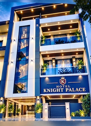 A multi-story hotel with a prominent sign reading 'KNIGHT PALACE HOTEL'. - Hotel Knight Palace (Agra)