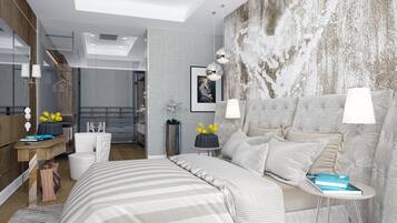 A modern bedroom with a large bed, bedside tables, a mirror, and a view into the adjacent bathroom.