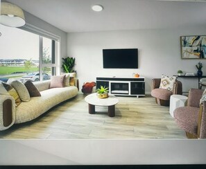 Living area - Spacious and comfort| Near Airport| Easy Access to Stoney Trail & the Rockies. (calgary)