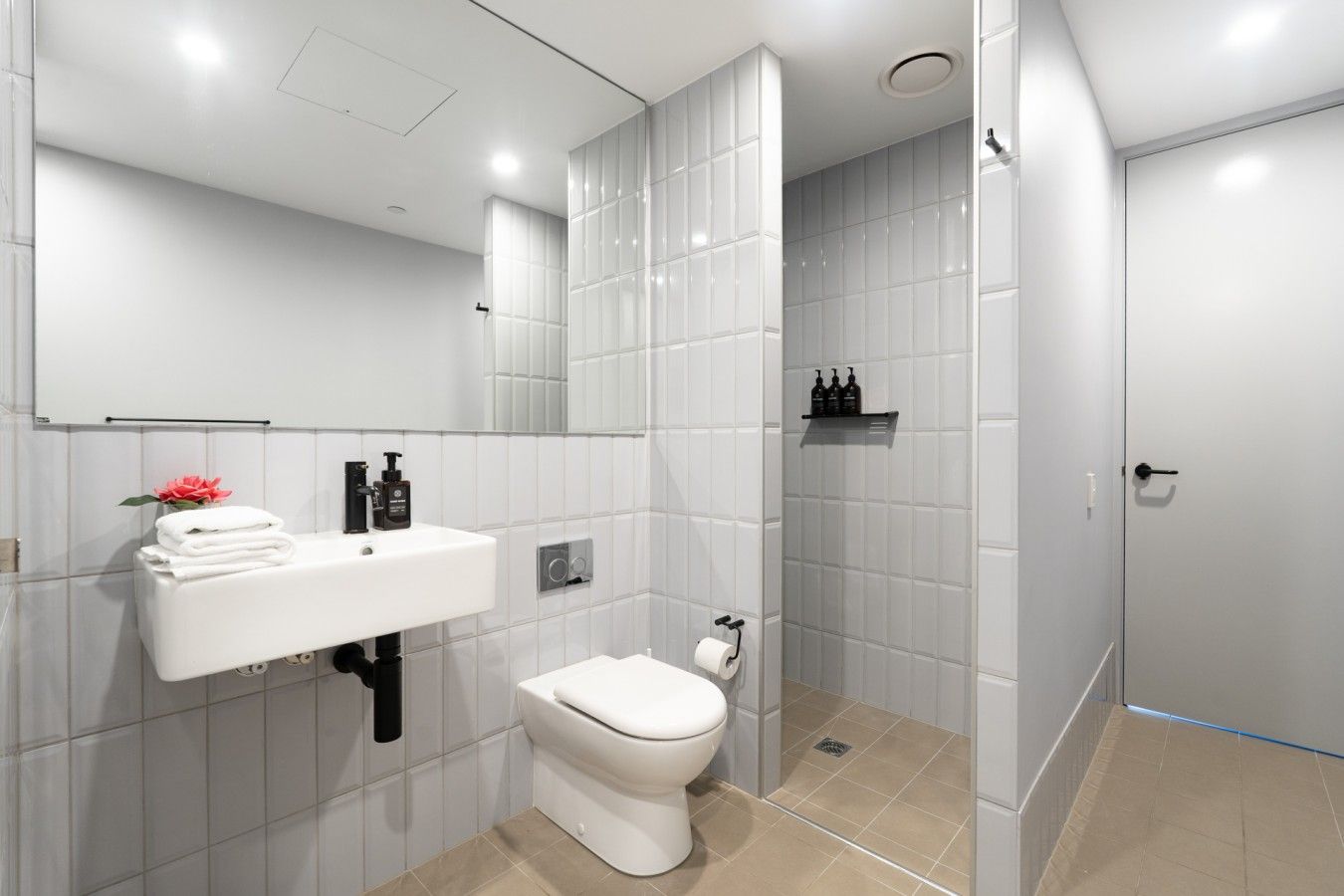 Bright, fresh and beautifully appointed, this bathroom offers a clean and comfortable space to refresh and get ready for the day.
