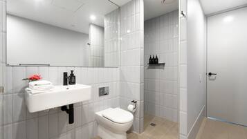 Bright, fresh and beautifully appointed, this bathroom offers a clean and comfortable space to refresh and get ready for the day.