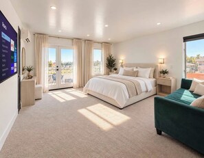 Ein modernes Schlafzimmer mit einem großen Bett, einem grünen Sofa und einem Balkon mit Gartenmöbeln.