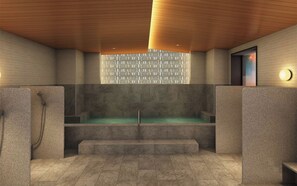 Une salle de spa moderne avec un banc en pierre, un plafond en bois et un mur orné de motifs.