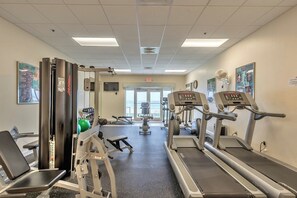 A gym with treadmills, weight machines, and exercise balls. - 4404 Harbour Village (Ponce Inlet)