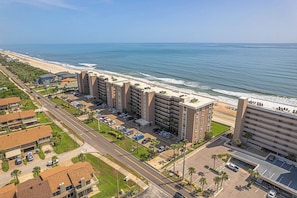 A coastal hotel with multiple floors, parking, and a beach view. - 501 Sandcastle S. in Ponce Inlet, FL (Ponce Inlet)