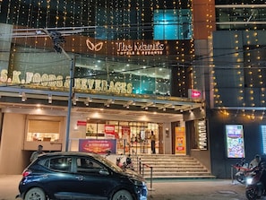 A hotel with a sign for 'The Maitis Hotels & Resorts' and a visible entrance. - The Mantis Hotels & Resorts (Muzaffarpur)