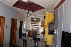 Dining - Serene 1BR 1BT Wi-Fi Kitchen Laundry TV Wardrobe (Ejisu)