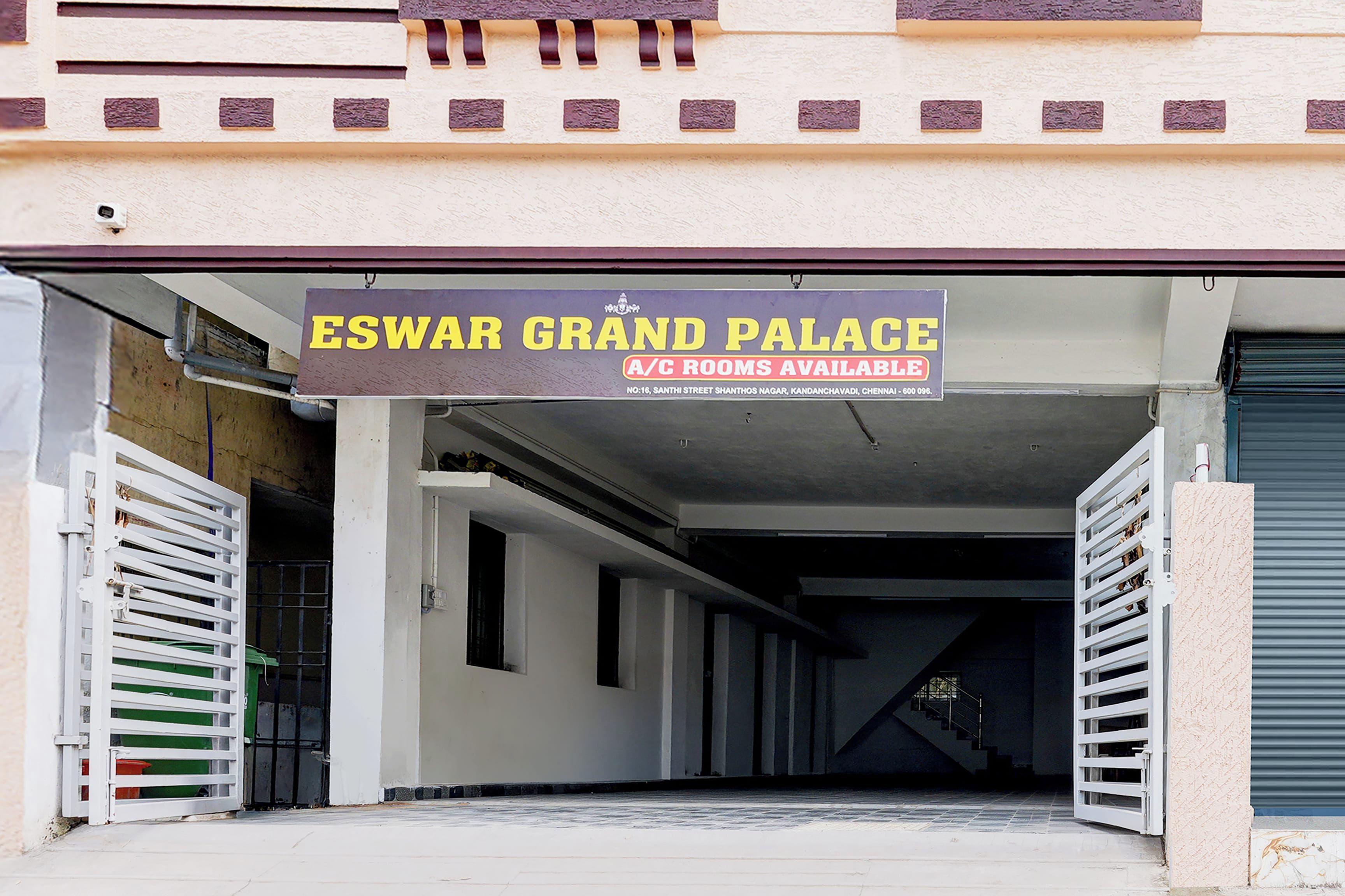 A sign for 'ESWAR GRAND PALACE' indicating A/C rooms are available.