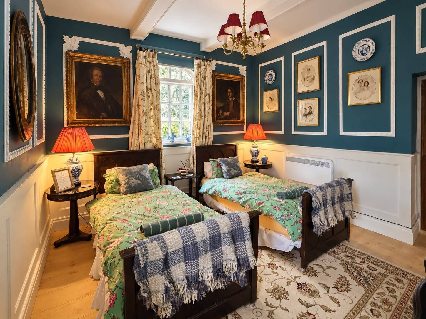 The Chinese Bedroom features comfortable twin beds, perfect for friends or colleagues sharing a cosy and inviting space.