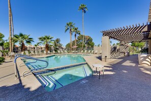 A pool area with lounge chairs and palm trees. - Pool & Spa! Stylish 2nd-floor Scottsdale Retreat (Scottsdale)