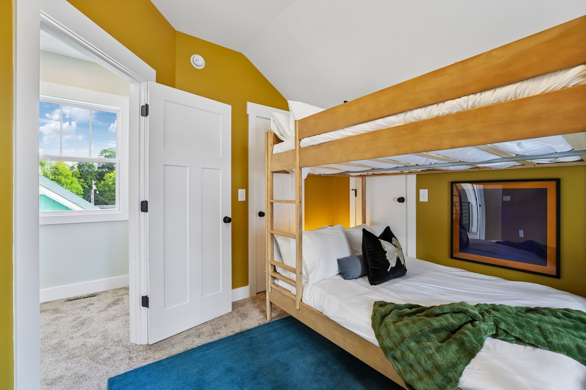 Bedroom 2: This cozy bunk bedroom offers a fun and comfortable sleeping setup, perfect for families or groups looking to relax and recharge during their stay.