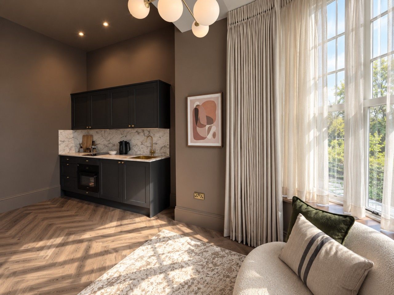 Well-equipped kitchen, and comfortable seating space