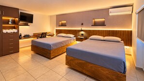 A modern hotel room with two beds, a coffee bar, and a TV. - Bowra Suite Privada 7, Colonia Americana (Guadalajara)