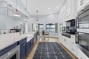 Gorgeous, fully-equipped kitchen features high-end stainless-steel appliances, and plenty of storage and counter top space - Modern Urban Retreat in Englewood, 1008 (Sarasota County)