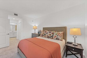 Primary bedroom with king bed and attached bathroom - Your Oasis Awaits in Punta Gorda, 5935 (Charlotte County)