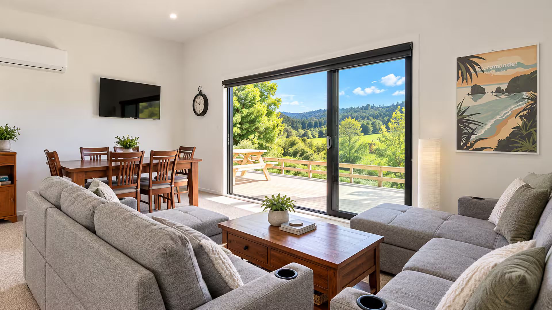 A modern living room with a sofa set, a wooden coffee table, and a dining area with chairs and a table.