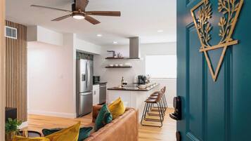Relax in this curated ground floor suite, inspired by the tropical plants of Florida.