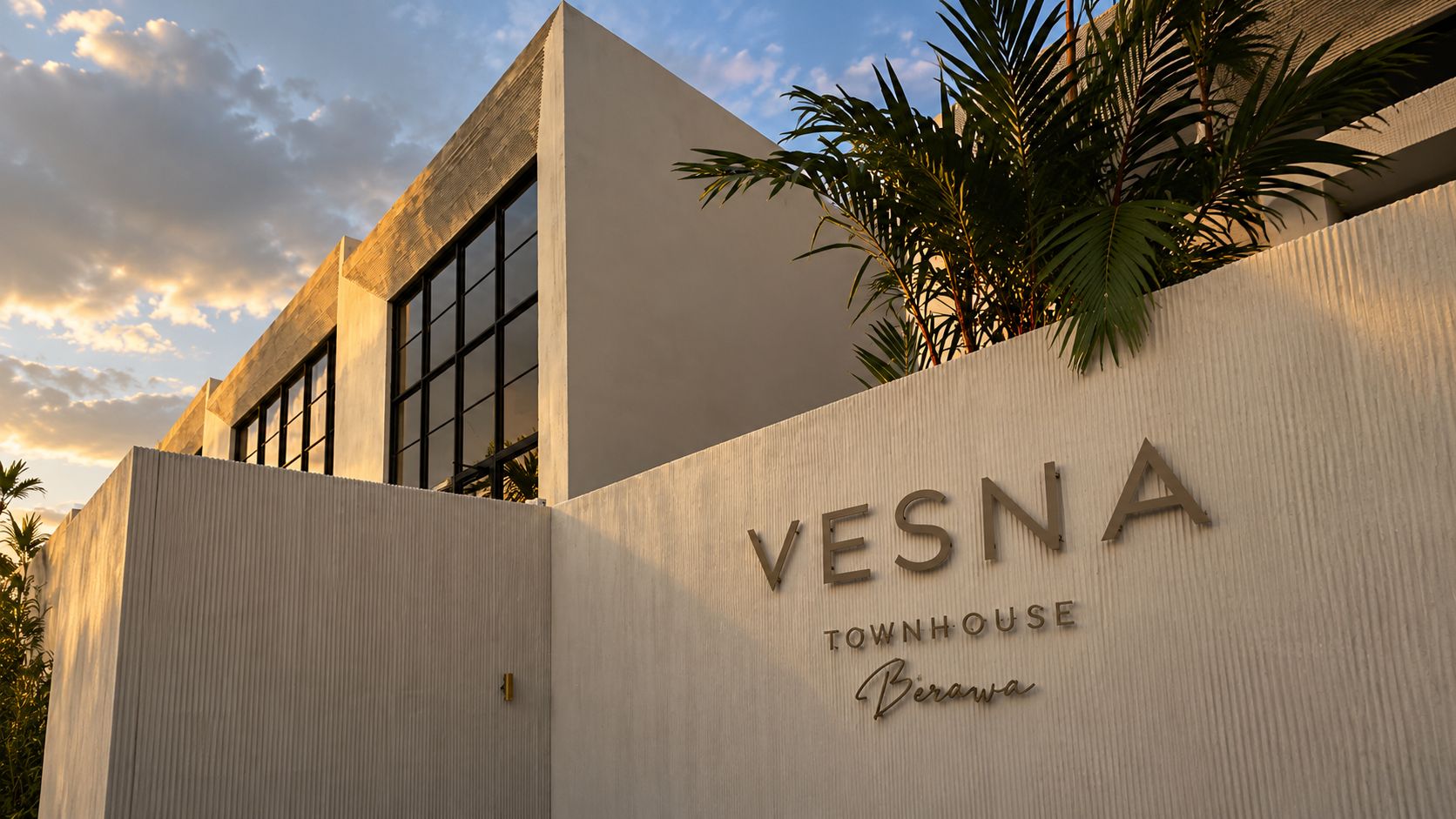 Un bâtiment portant l’enseigne « VESNA TOWNHOUSE Berawa », indiquant qu’il s’agit d’un immeuble résidentiel.