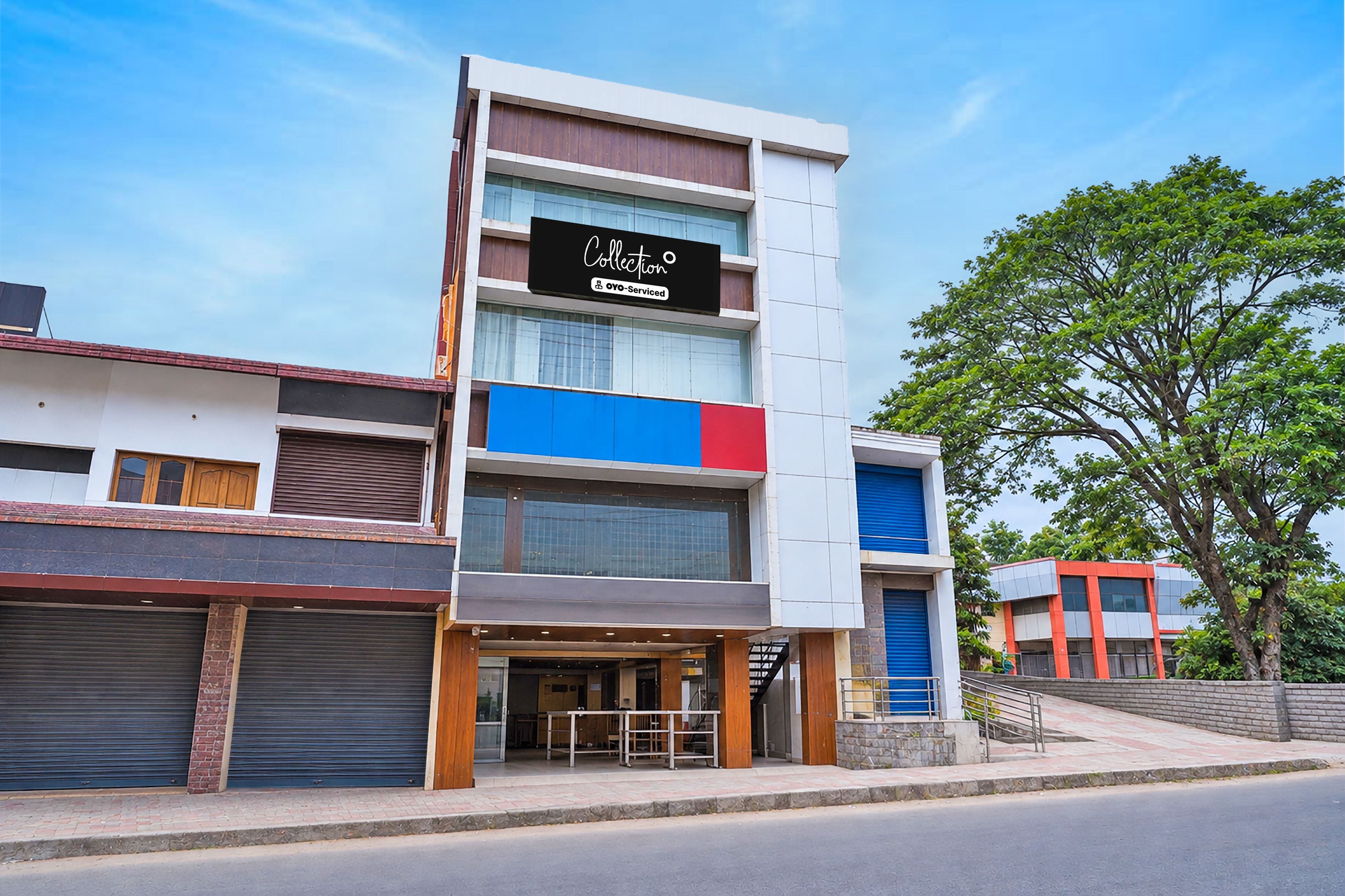 A multi-story building with a storefront on the ground floor.