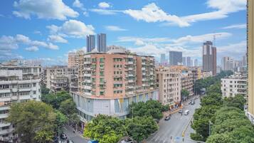 A multi-story building with a central courtyard surrounded by residential units.