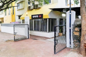 A gated entrance to a hotel with a sign indicating it is a 'OYO Hotel'. - Hotel O Luxe Villa (Nagpur)