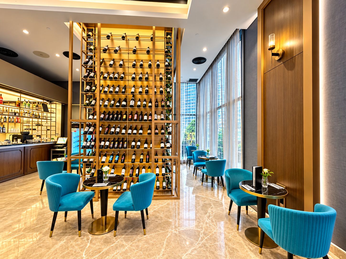 A hotel lobby with a wine rack, seating area, and a bar.