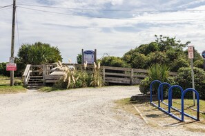 A gated entrance with a sign indicating private property and a no parking sign. - Cozy 1 BR in Sea Mist! (Carolina Beach)