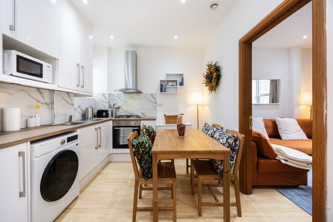 Kitchen dining area beside the living room