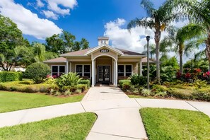 A two-story house with a number 2941 displayed above the entrance. - 4BR Gated Home Near Disney, Sleeps 10 (Kissimmee)