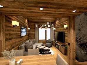 A cozy living room with a wooden interior, a sofa set, a coffee table, and a flat-screen TV. - Central duplex, mountain view - 4 guests (Val-d'Isère)