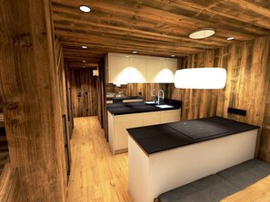 A modern kitchen with wooden paneling, a central island, and a built-in sink. - Central duplex, mountain view - 4 guests (Val-d'Isère)