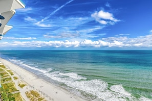 A beach with clear skies and ocean waves. - Penthouse Paradise, Oceanfront Corner 2BD/2BA w/Panoramic Views, Prime location. (Myrtle Beach)