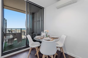 Dining - Top Floor City Escape | 180° Views, Pool, Parking (Melbourne)