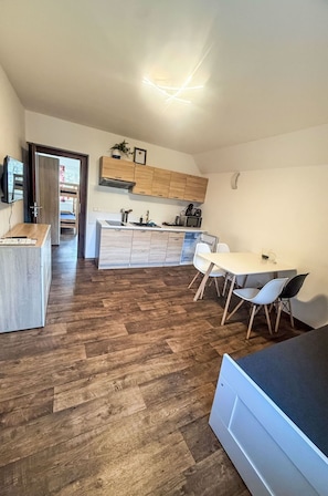 Furniture, Interior Design, Flooring, Ceiling, Floor, Chair, Room, Lighting, Table, Kitchen & Dining Room Table