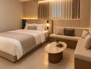 A modern bedroom with a large bed, a sofa, and a coffee table. - Ravion (Seoul)