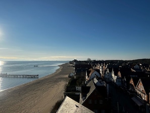 A coastal town with a beach, a pier, and traditional buildings. - Holiday Apartment in Wyk on Fohr With Balcony (Wyk auf Foehr)