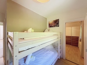 A bunk bed room with a door leading to a closet. - Wiesbachhorn am See by Interhome (Zell am See)
