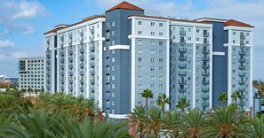 A multi-story residential building with balconies, a flat roof, and a clear sky. - Resort 1 bedroom in Anaheim for National Association of Music Merchants - NAMN (Anaheim)