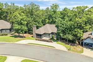 A residential area with houses, a driveway, and a street. - 3 bedroom, 2 bath, with pool house, lake-access, boat slip on Lake Martin (Tallassee)