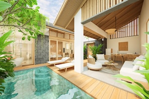 A modern outdoor pool area with lounge chairs, a dining area, and a kitchen visible through a glass partition. - Athene Villa Seseh (Badung)